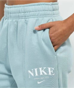 Nike Sportswear Essential Light Blue Fleece Sweatpants -Swimwear Store Nike Sportswear Essential Light Blue Fleece Sweatpants 356205 alt2 US