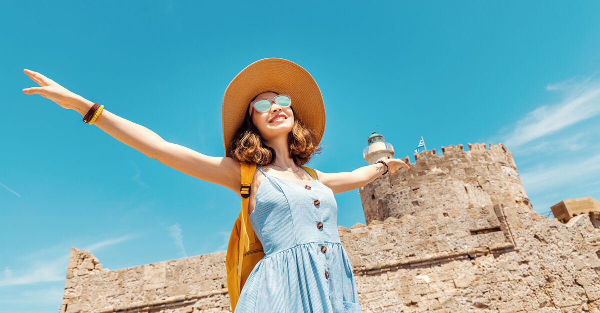 Swimwear Store 2 Swimwear Store -Swimwear Store woman tourist dress hat sunglasses happy 1200x627 1